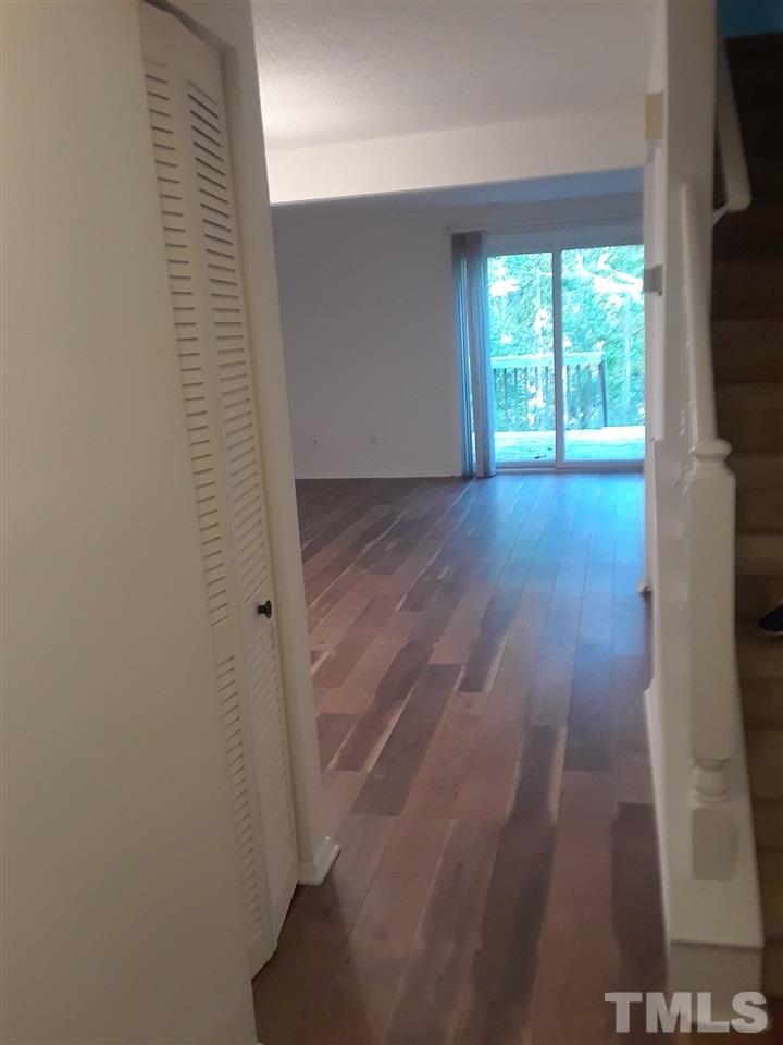 7762 Sandra Lane Raleigh, NC 27615 - Photo 1 of 9 a view of hallway with a window