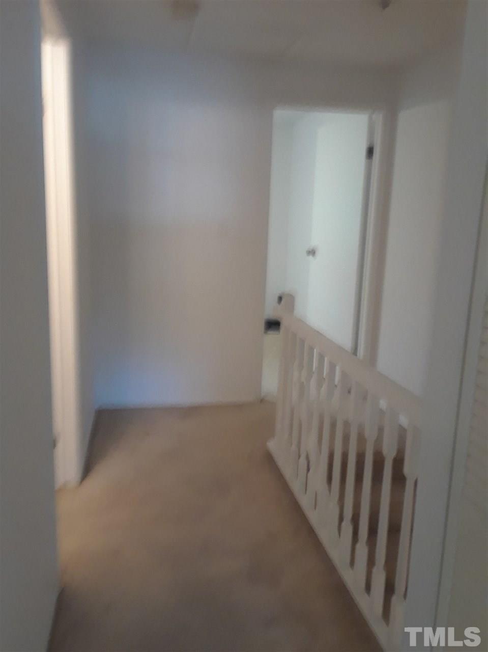 7762 Sandra Lane Raleigh, NC 27615 - Photo 8 of 9 a view of a room with white walls