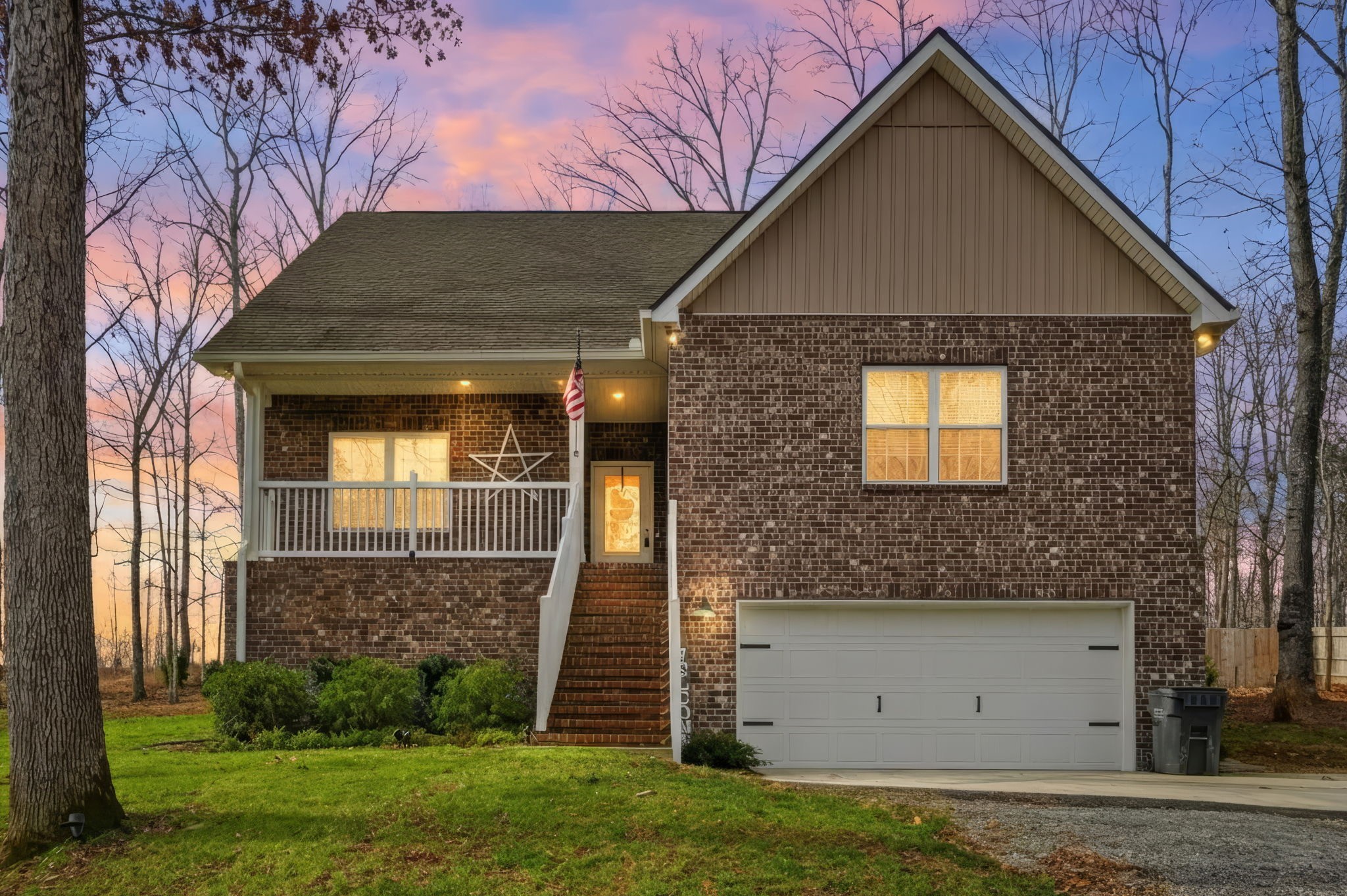 1578 Old Gallatin Road Portland, TN 37148 - Photo 1 of 32 a front view of a house with garden