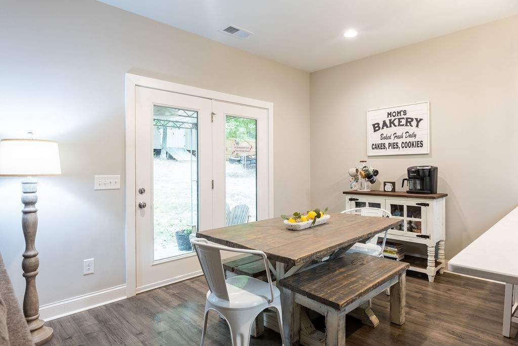 1578 Old Gallatin Road Portland, TN 37148 - Photo 14 of 32 a view of a dining room with furniture and wooden floor