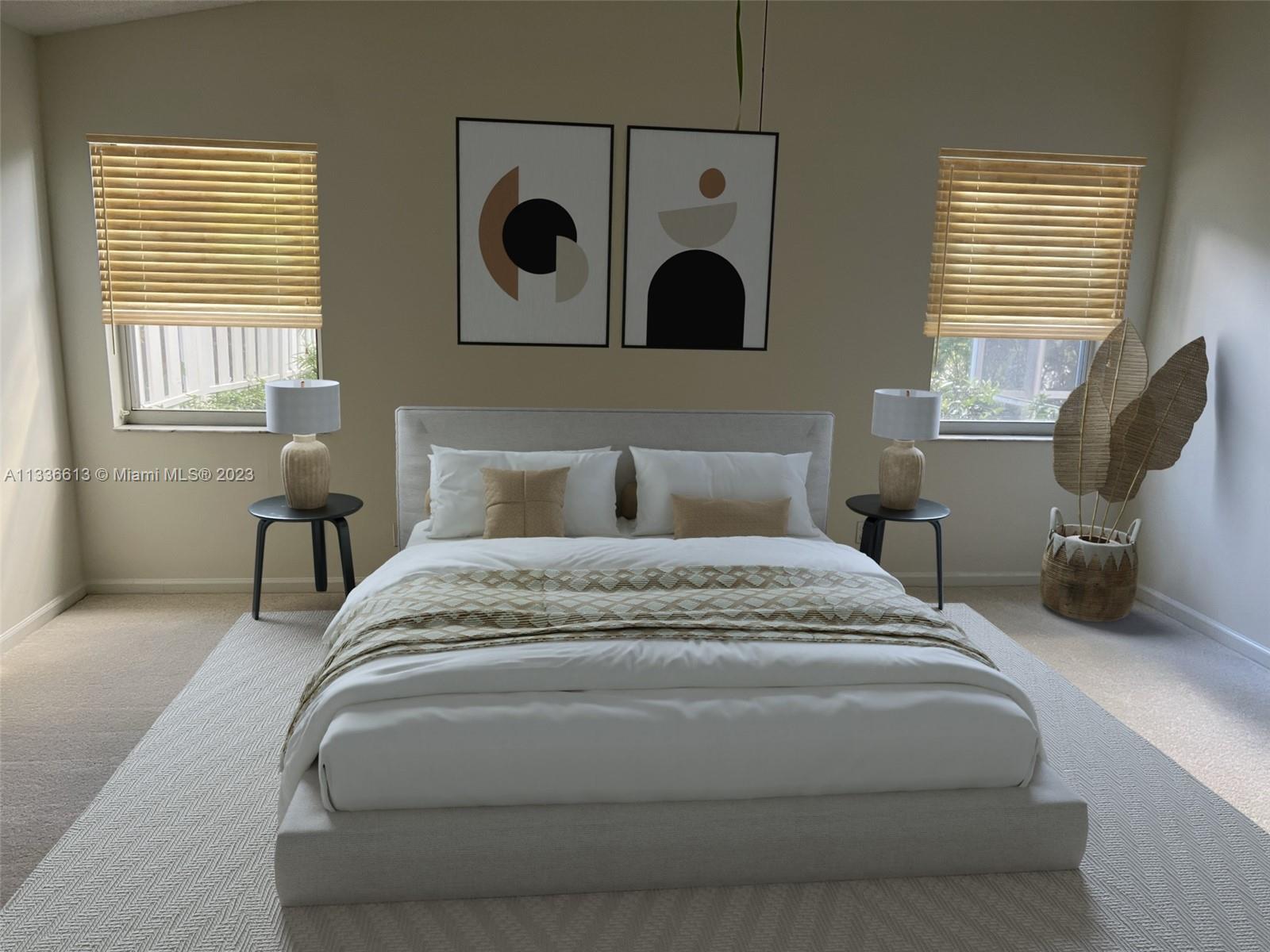 9650 Harbour Lake Circle Boynton Beach, FL 33437 - Photo 14 of 37 a large bed sitting in a bedroom next to a window