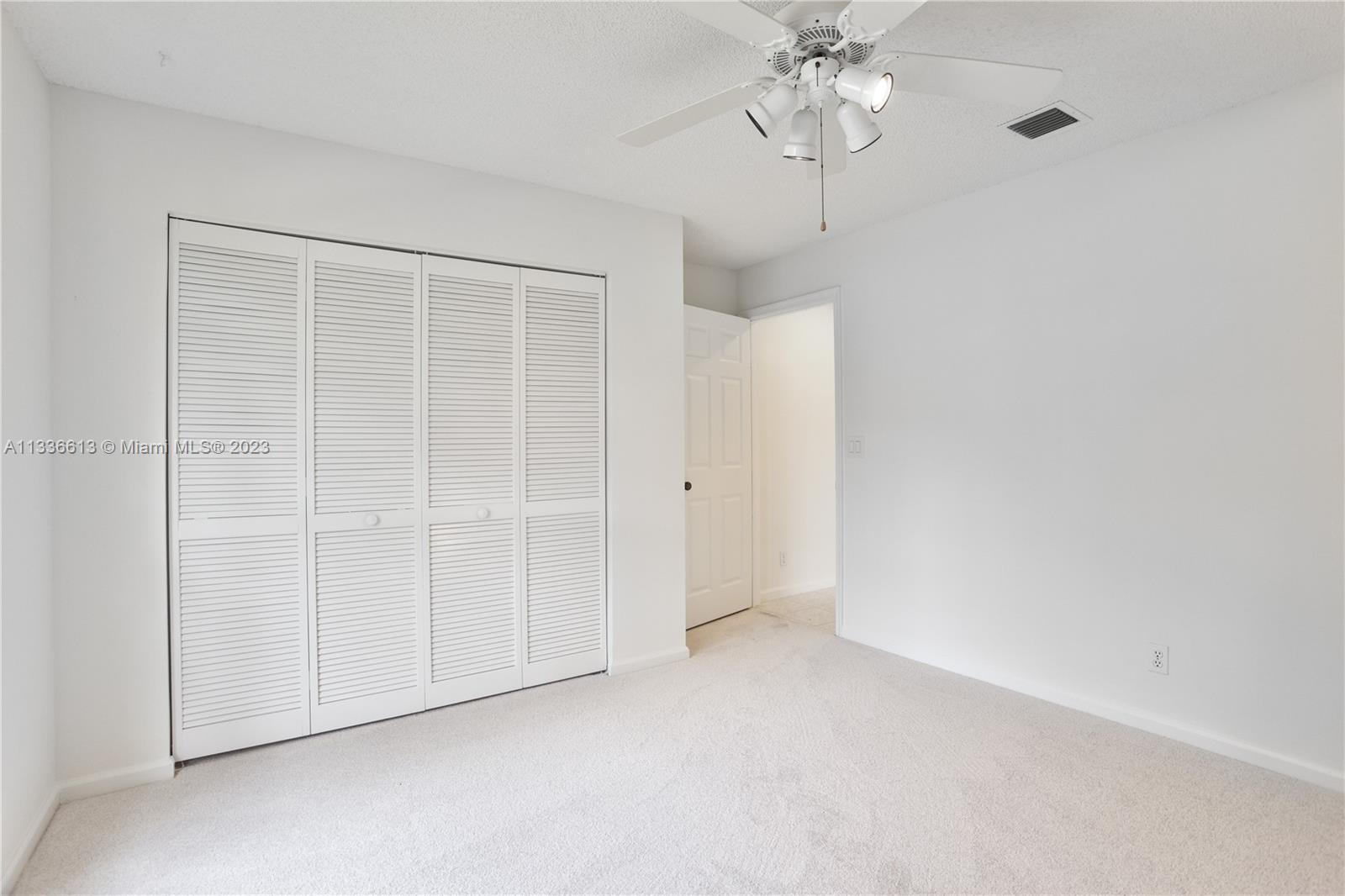 9650 Harbour Lake Circle Boynton Beach, FL 33437 - Photo 19 of 37 a view of an empty room with a window