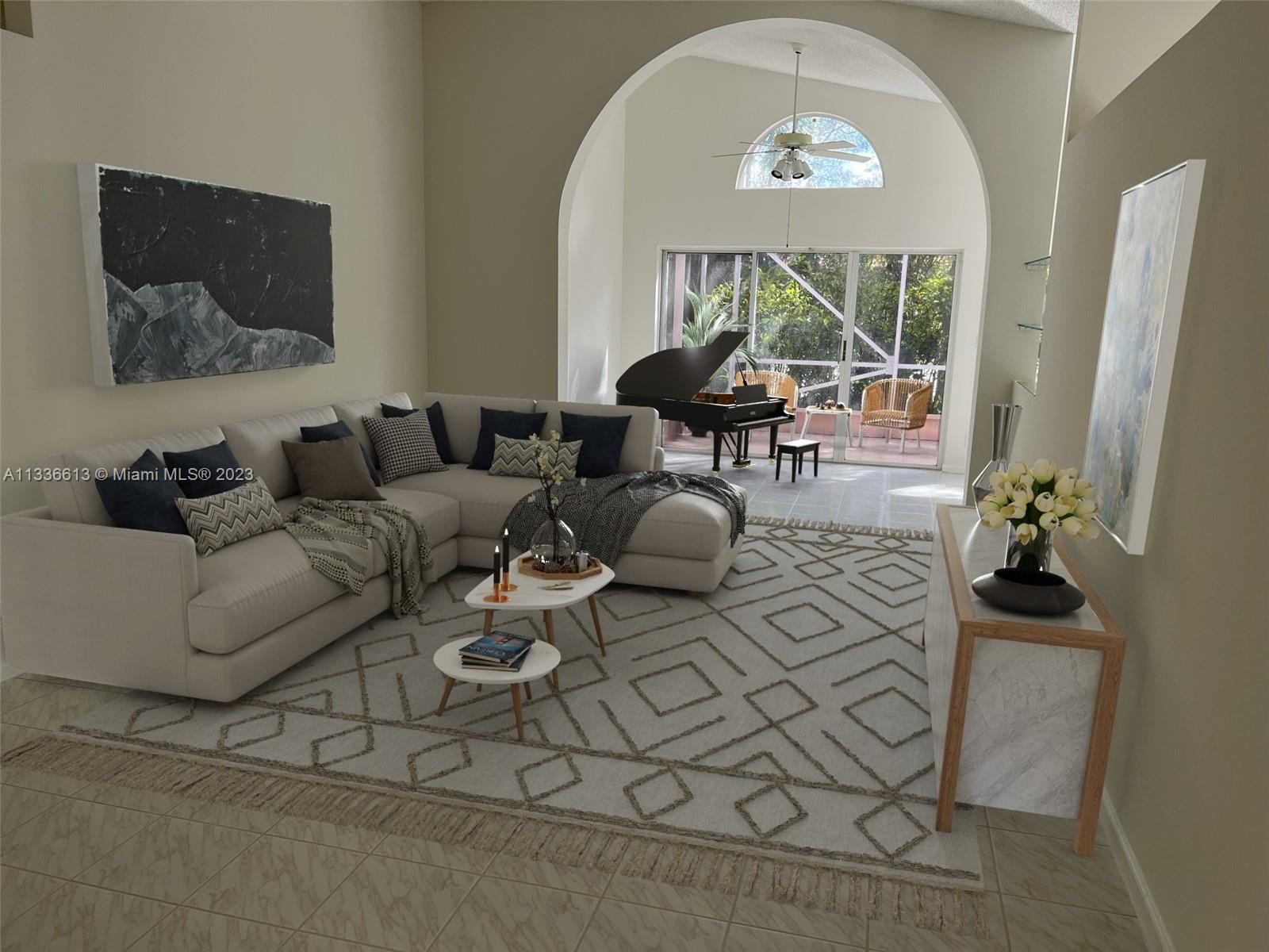9650 Harbour Lake Circle Boynton Beach, FL 33437 - Photo 3 of 37 a living room with furniture a floor to ceiling window and a flat screen tv