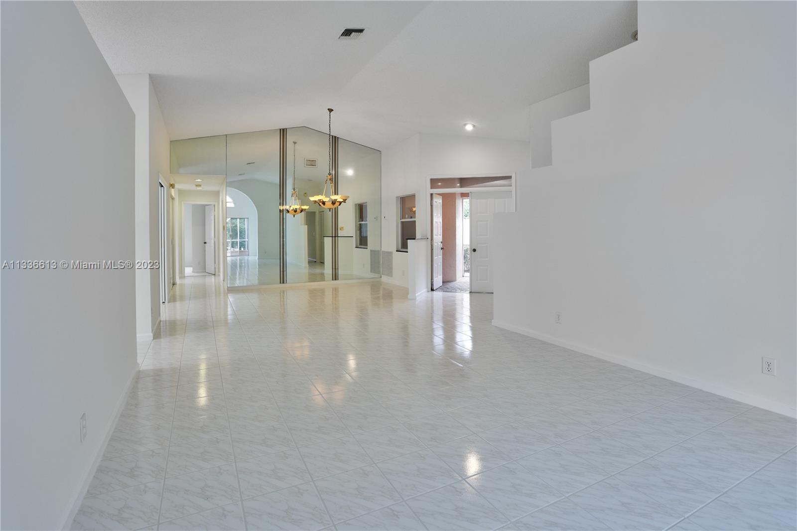 9650 Harbour Lake Circle Boynton Beach, FL 33437 - Photo 5 of 37 a view of a hallway with a bathroom