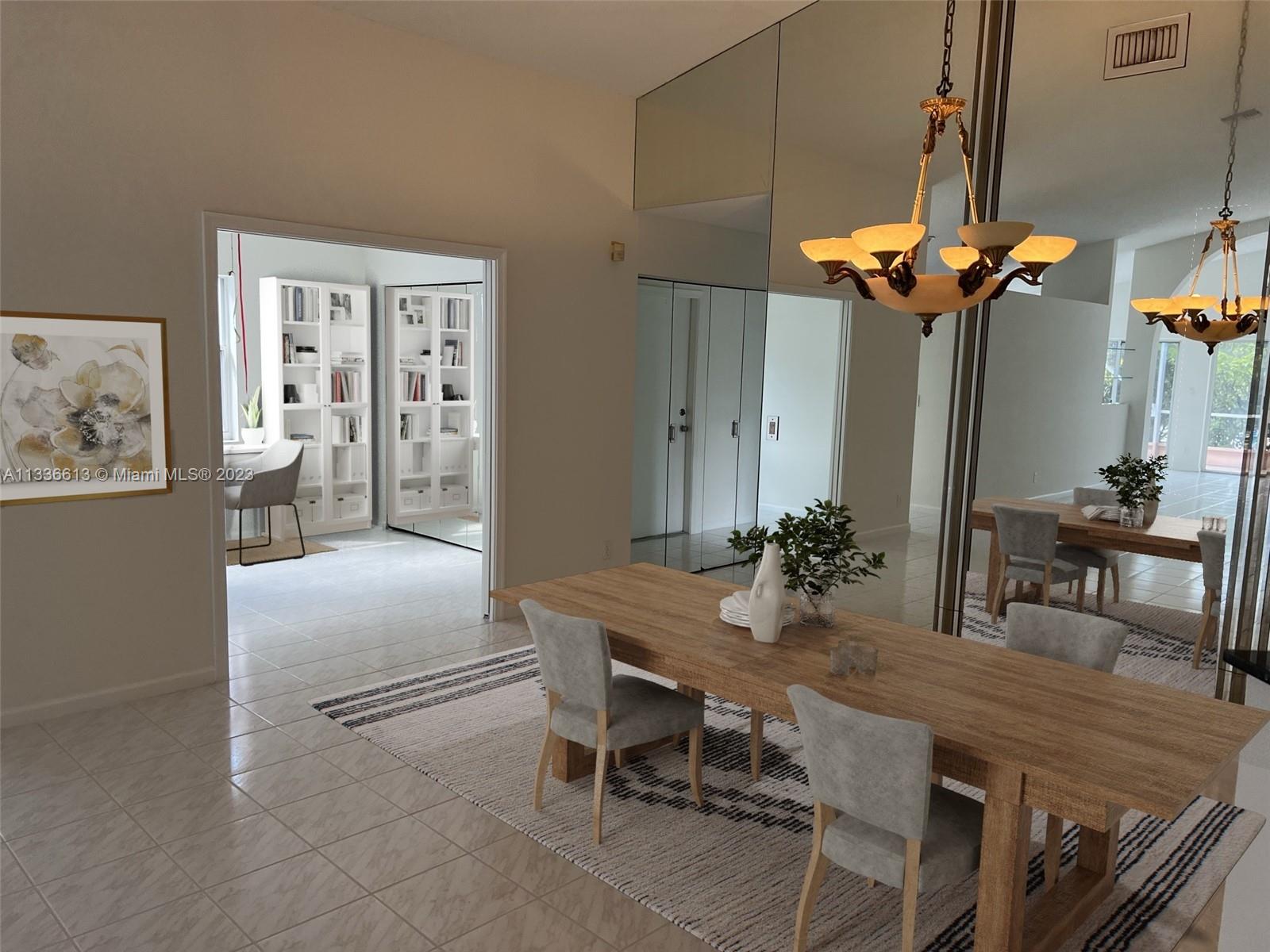 9650 Harbour Lake Circle Boynton Beach, FL 33437 - Photo 7 of 37 a view of a dining room with furniture and chandelier