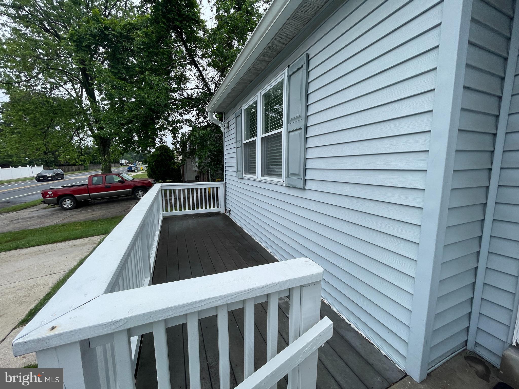 7944 Tick Neck Road Pasadena, MD 21122 - Photo 3 of 40 Front Deck w/ Composite Flooring