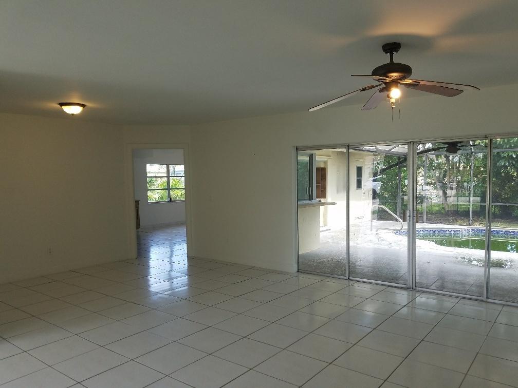 4666 Armadillo Street Boca Raton, FL 33428 - Photo 3 of 15 Living/dining room