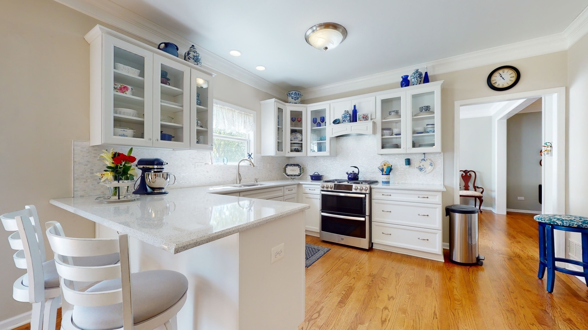 787 Laurel Lane Cary, IL 60013 - Photo 12 of 37 a kitchen with stainless steel appliances granite countertop a stove and cabinets