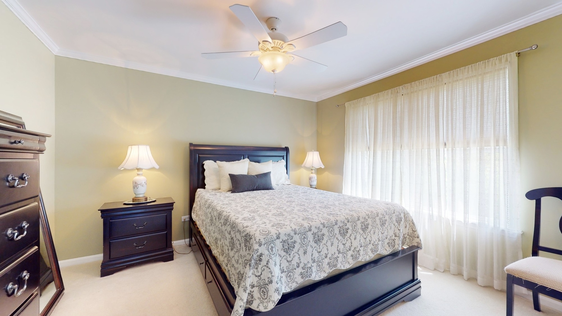 787 Laurel Lane Cary, IL 60013 - Photo 25 of 37 a bedroom with a bed and a lamp on the dresser