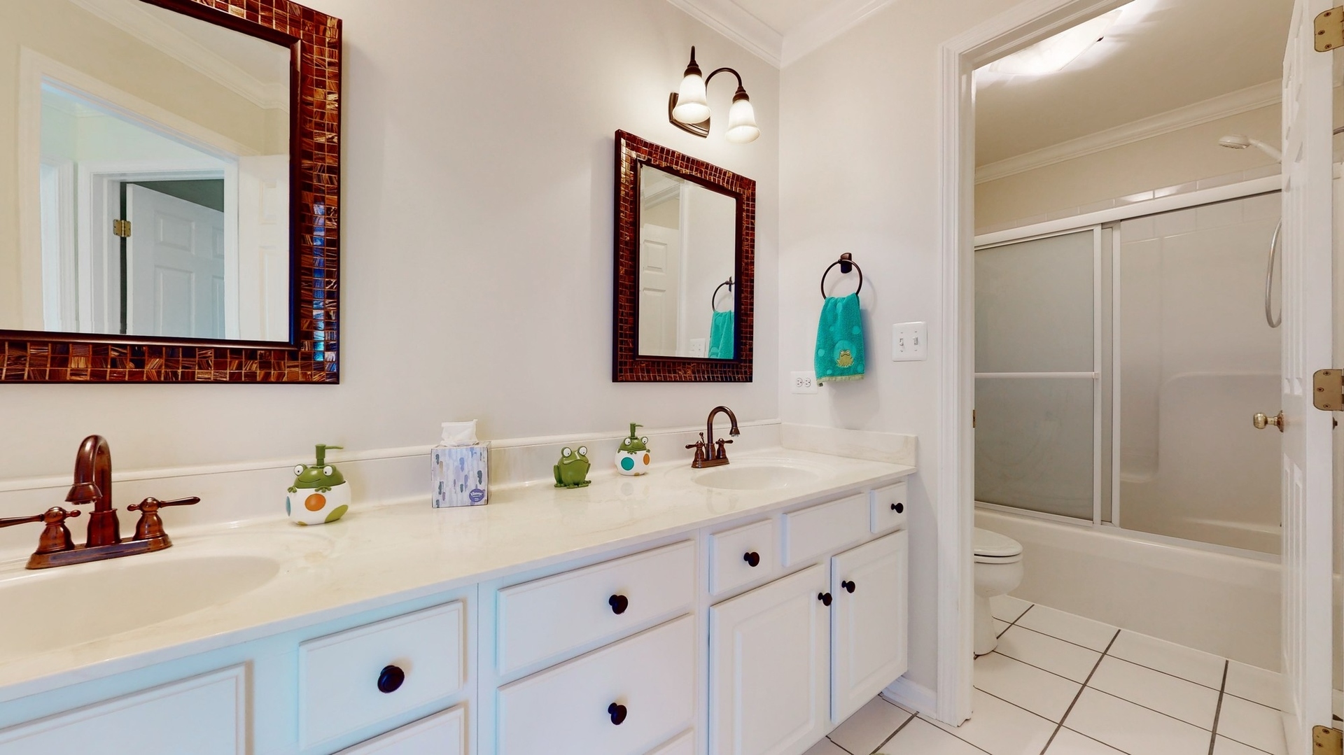 787 Laurel Lane Cary, IL 60013 - Photo 27 of 37 a bathroom with a double vanity sink mirror and bathtub