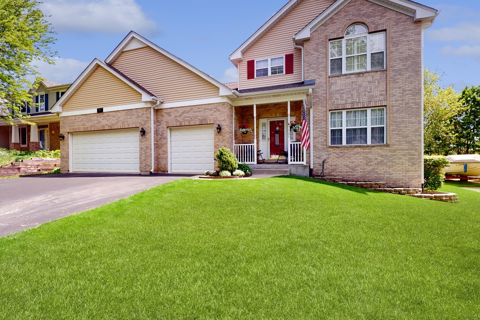 787 Laurel Lane Cary, IL 60013 - Photo 3 of 37 a front view of a house with a yard and pathway