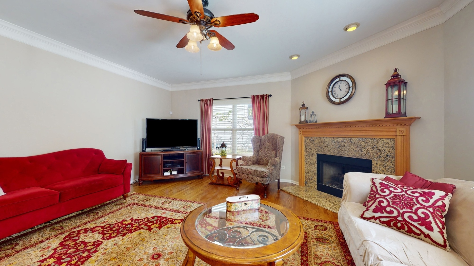 787 Laurel Lane Cary, IL 60013 - Photo 7 of 37 a living room with furniture and a fireplace
