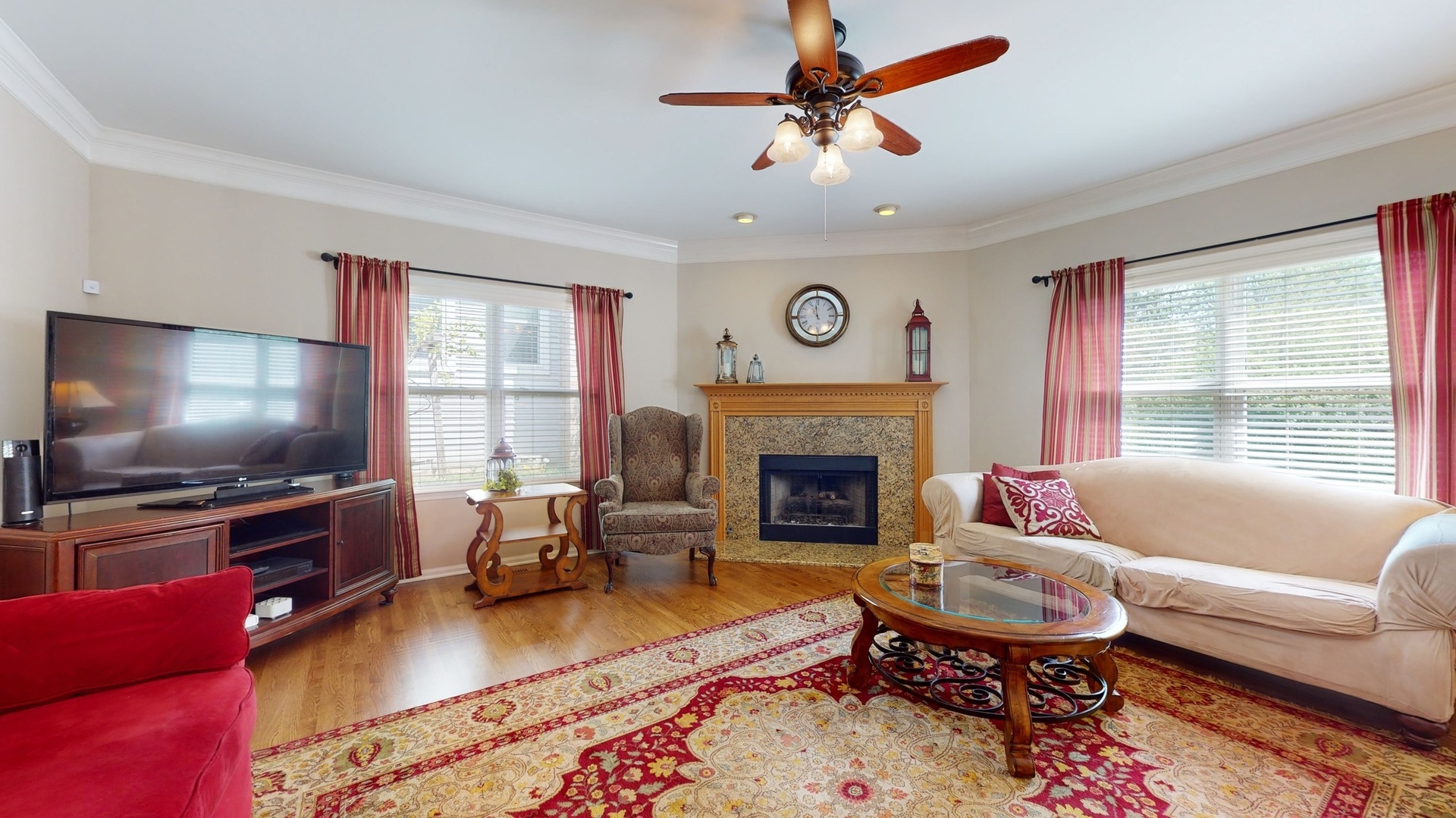 787 Laurel Lane Cary, IL 60013 - Photo 9 of 37 a living room with furniture and a flat screen tv
