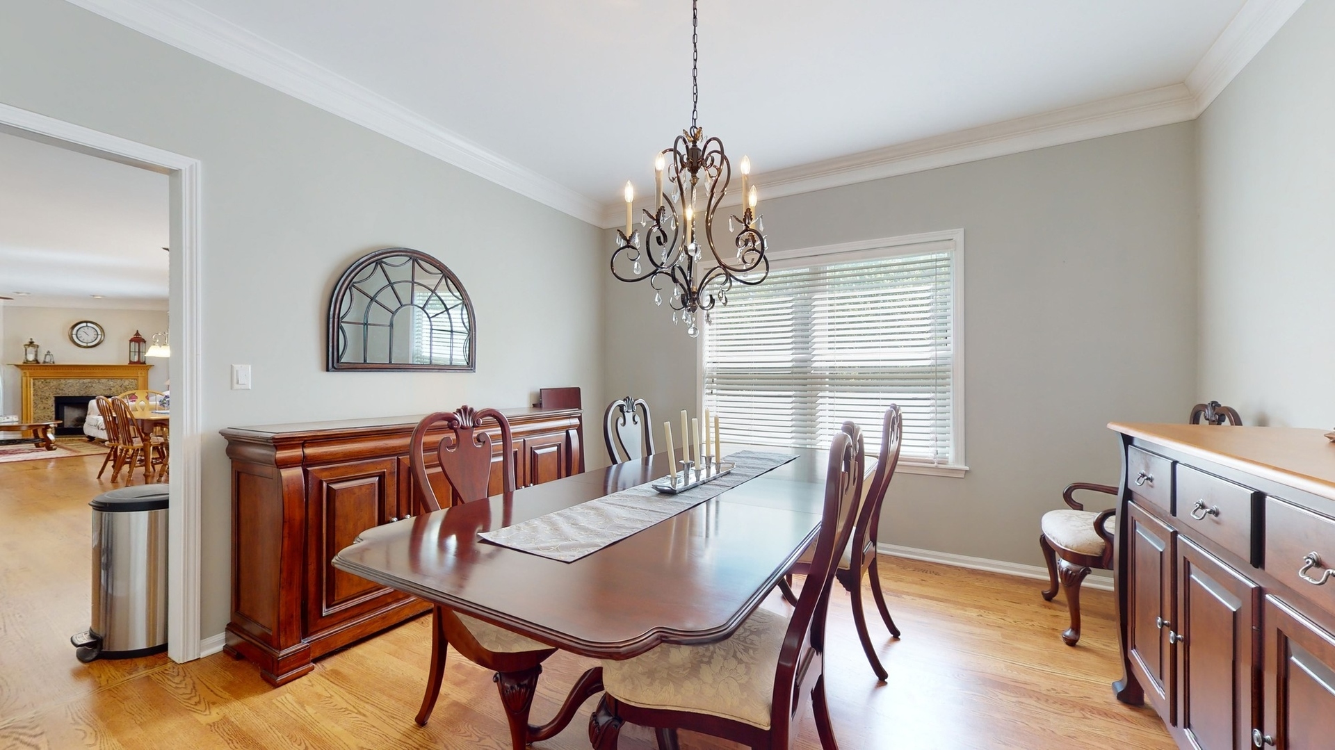 787 Laurel Lane Cary, IL 60013 - Photo 10 of 37 a view of a dining room with furniture window and wooden floor