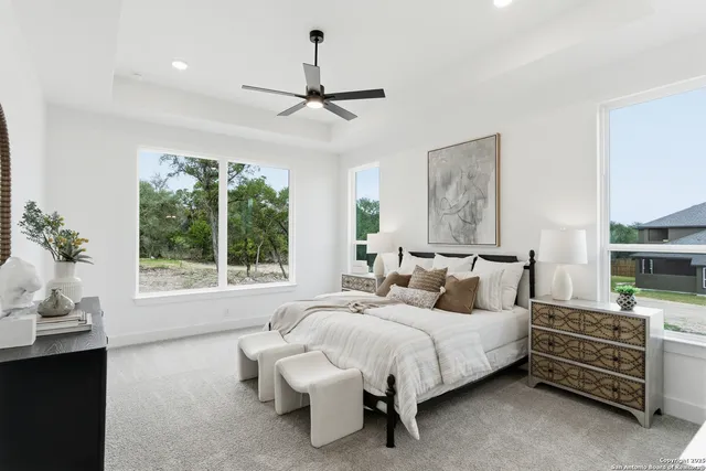 a bed room with a bed window and a couch