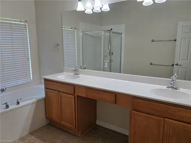 a white toilet sitting next to a window