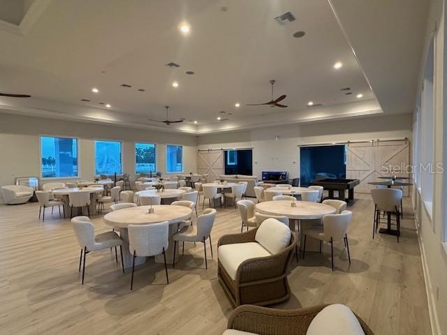 9001 Gasparilla Road, Unit 86 Placida, FL 33947 - Photo 12 of 75 a living room with lots of furniture and a view of kitchen