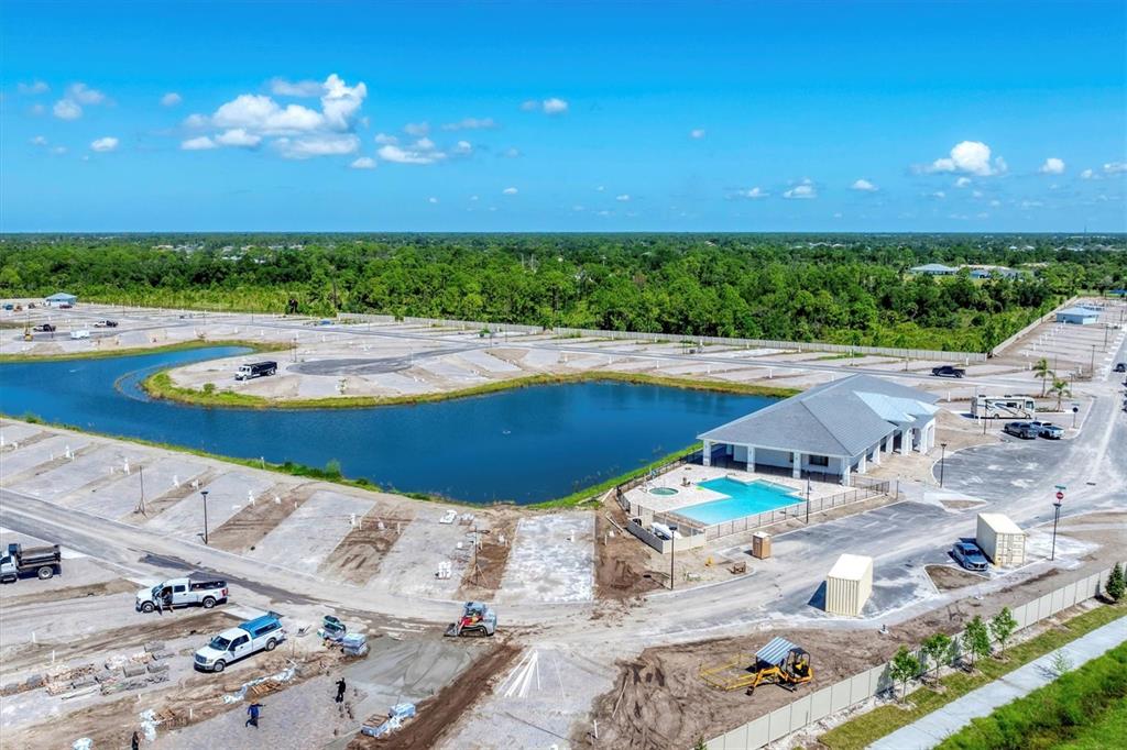 9001 Gasparilla Road, Unit 86 Placida, FL 33947 - Photo 61 of 75 a view of a swimming pool with an outdoor space and seating area