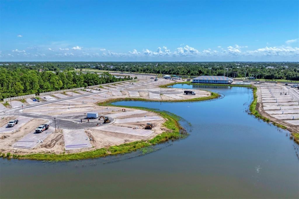9001 Gasparilla Road, Unit 86 Placida, FL 33947 - Photo 65 of 75 a view of a swimming pool and an outdoor space