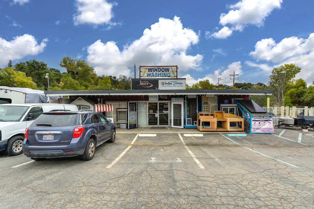 340 Green Valley Road El Dorado Hills, CA 95762 - Photo 17 of 33 a view of a cars park in front of house