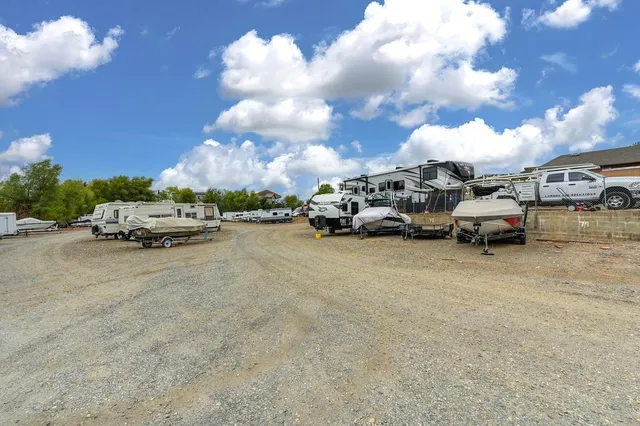 a view of car parked on the side of street