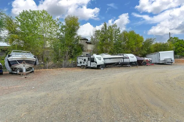 a view of a house with a big yard