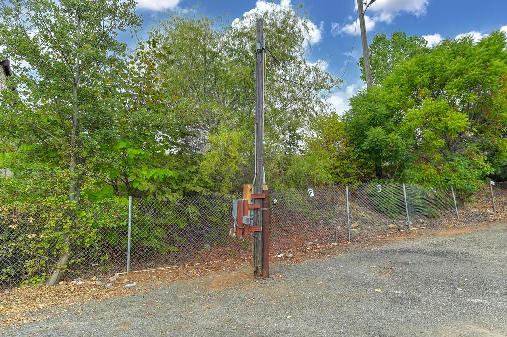 340 Green Valley Road El Dorado Hills, CA 95762 - Photo 27 of 33 a flag is sitting in middle of forest