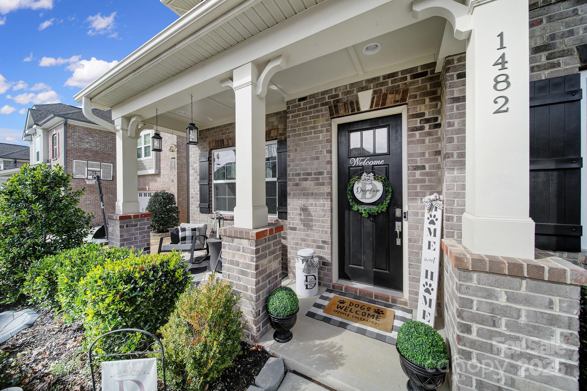 1482 Afton Way Fort Mill, SC 29708 - Photo 2 of 11 a front view of a building with sitting area