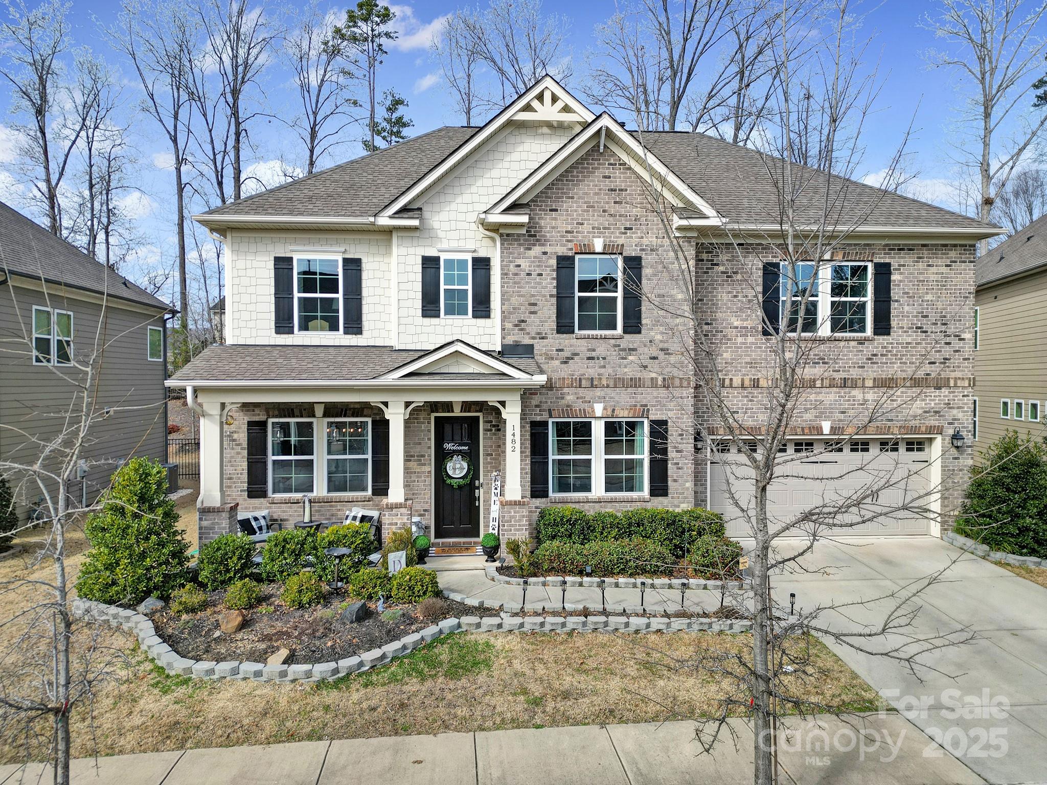 1482 Afton Way Fort Mill, SC 29708 - Photo 8 of 11 a view of a white house next to a yard
