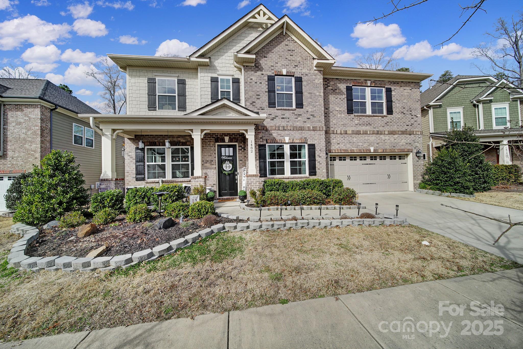 1482 Afton Way Fort Mill, SC 29708 - Photo 10 of 11 a front view of a house with a garden