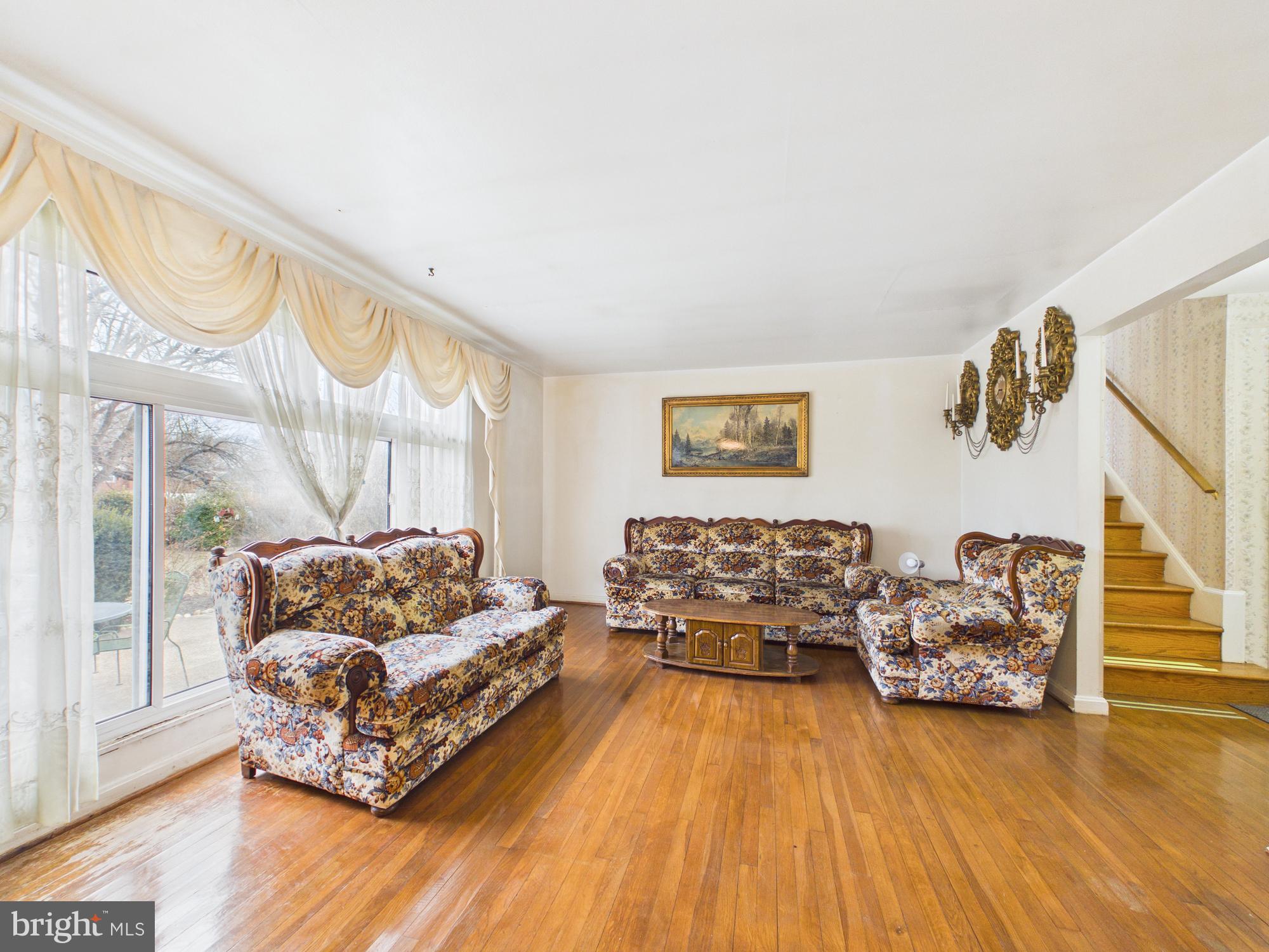 5907 Camberly Avenue Springfield, VA 22150 - Photo 14 of 41 a living room with furniture and a large window