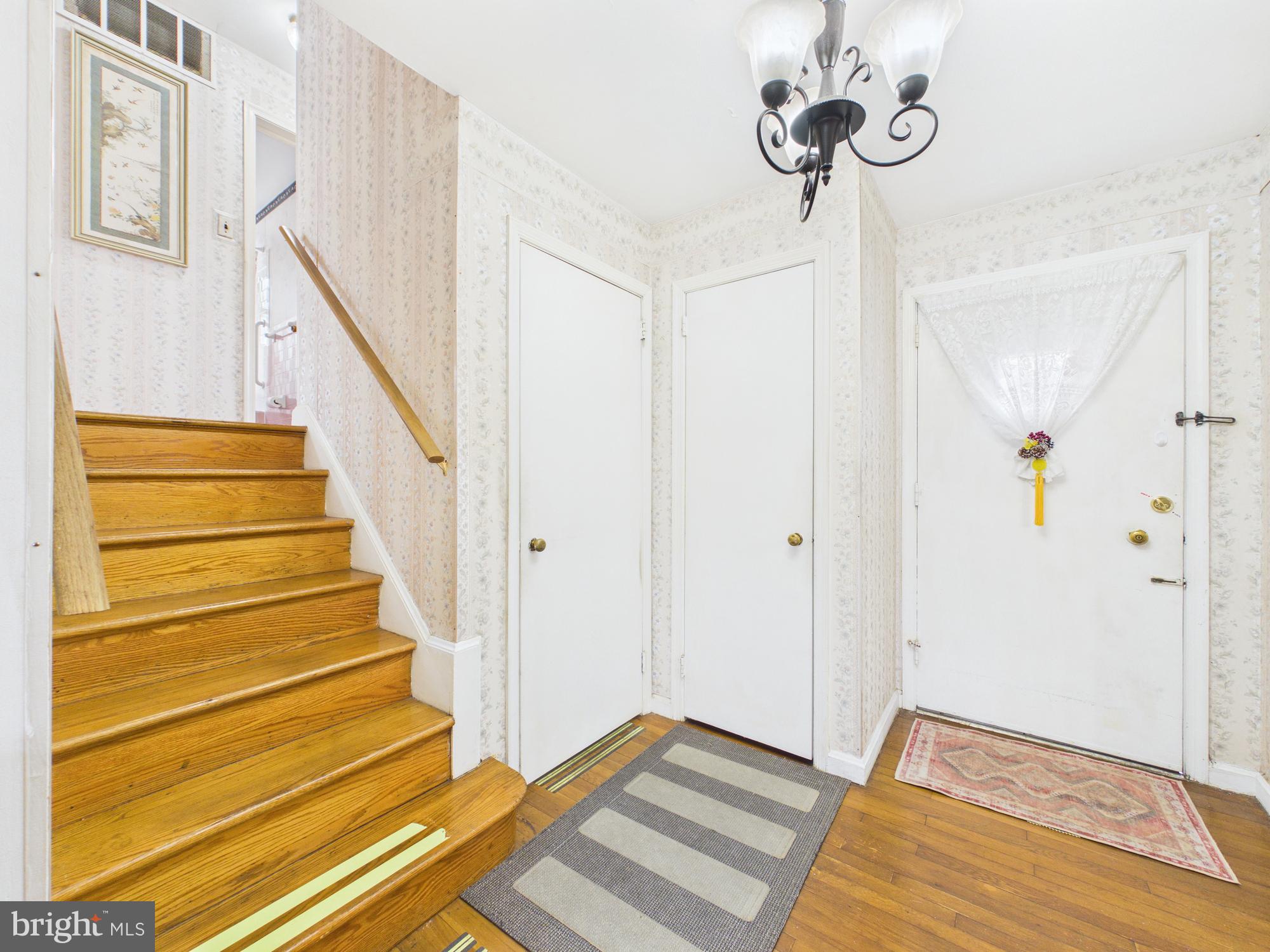 5907 Camberly Avenue Springfield, VA 22150 - Photo 2 of 41 a view of an entryway with staircase