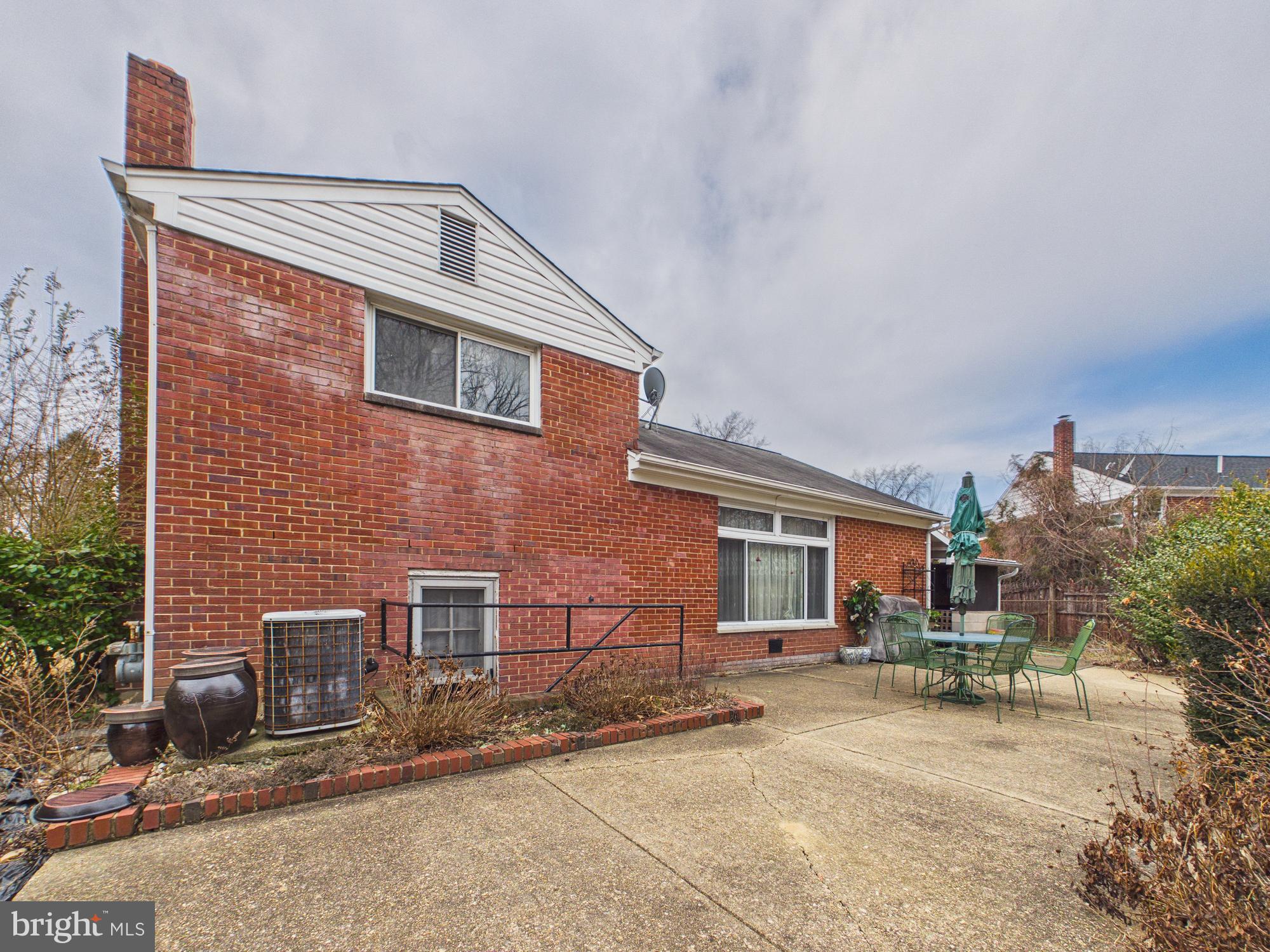 5907 Camberly Avenue Springfield, VA 22150 - Photo 32 of 41 a front view of a house with yard