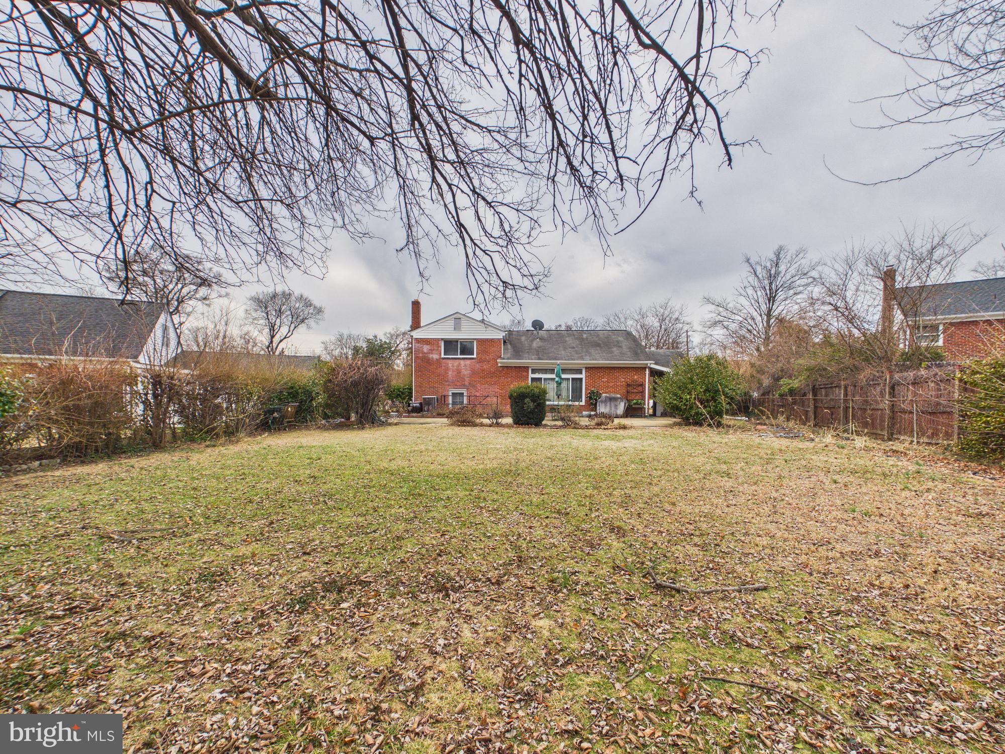 5907 Camberly Avenue Springfield, VA 22150 - Photo 35 of 41 a view of a house with a yard