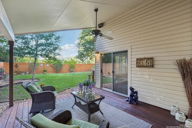 a house view with a seating space and garden