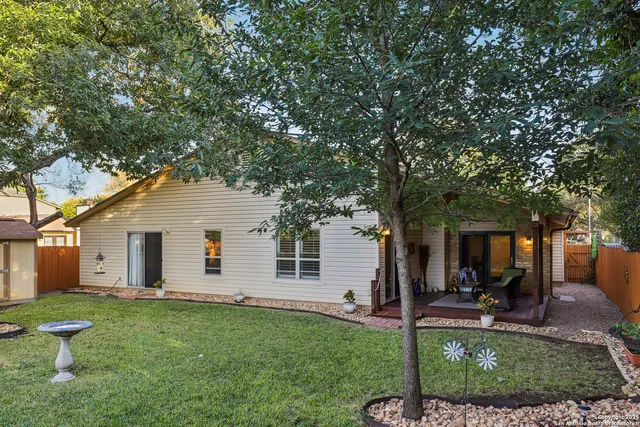 a backyard of a house with seating space