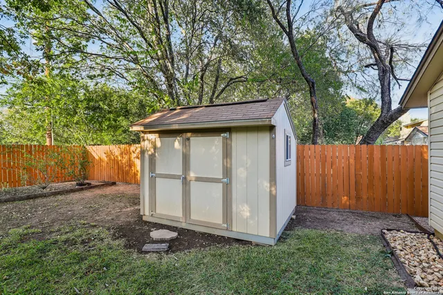 a backyard of a house with lots of green space