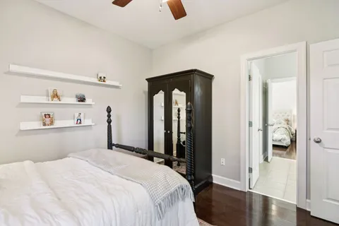 a bedroom with a bed and a closet