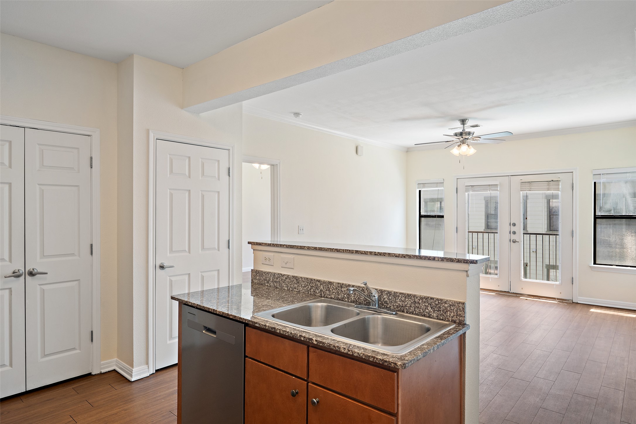2502 Leon Street, Unit 417 Austin, TX 78705 - Photo 5 of 26 a kitchen with a sink and cabinets