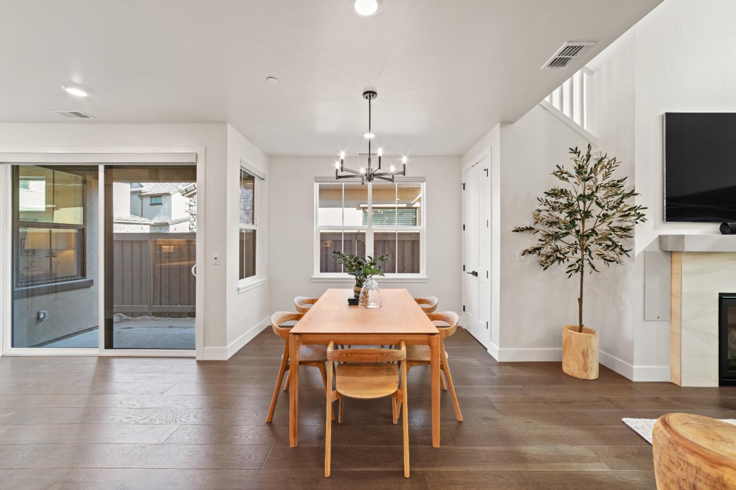 8465 Serene View Road Granite Bay, CA 95746 - Photo 12 of 70 a dining room with furniture window and wooden floor