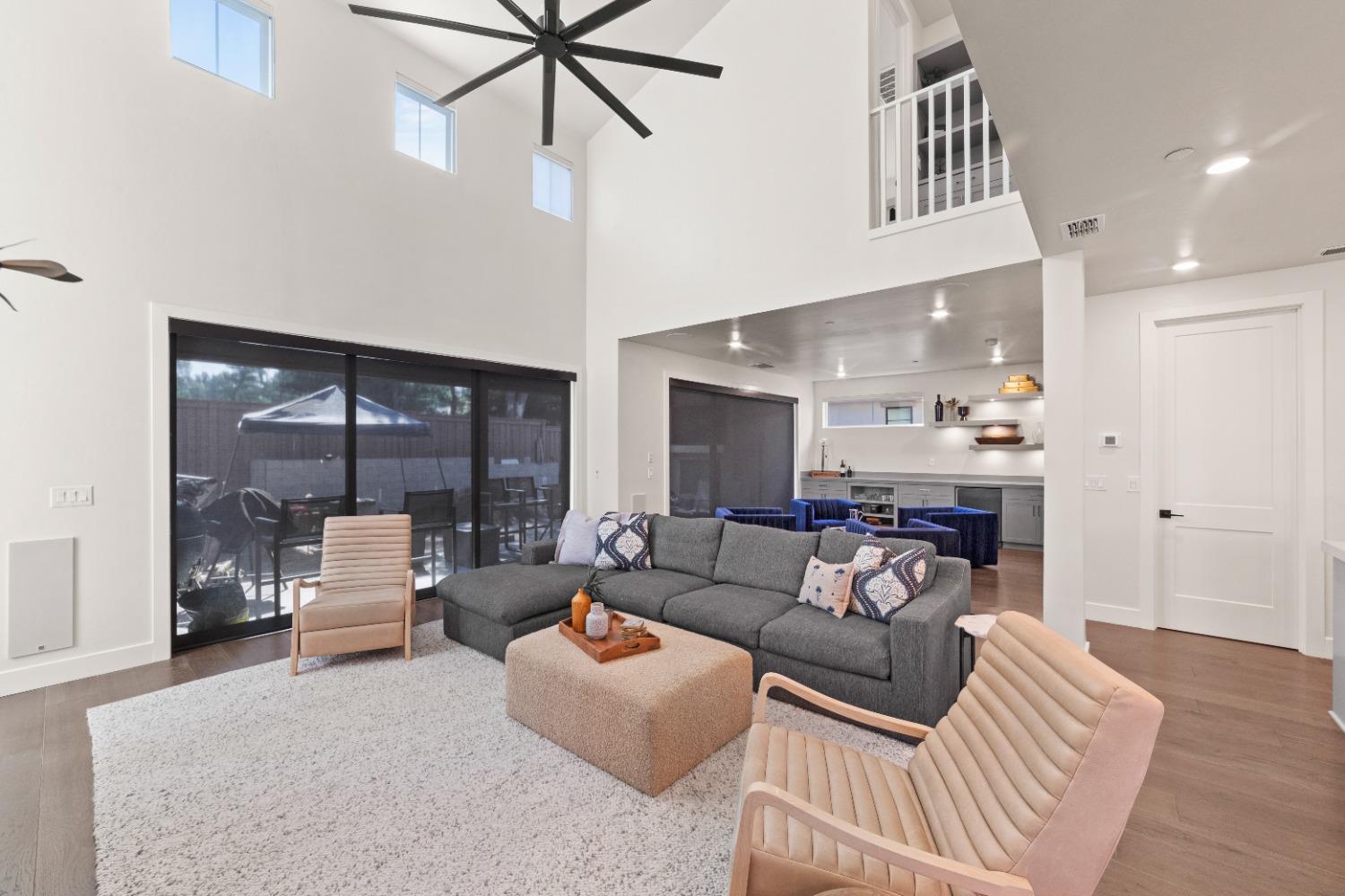 8465 Serene View Road Granite Bay, CA 95746 - Photo 18 of 70 a living room with furniture and a large window
