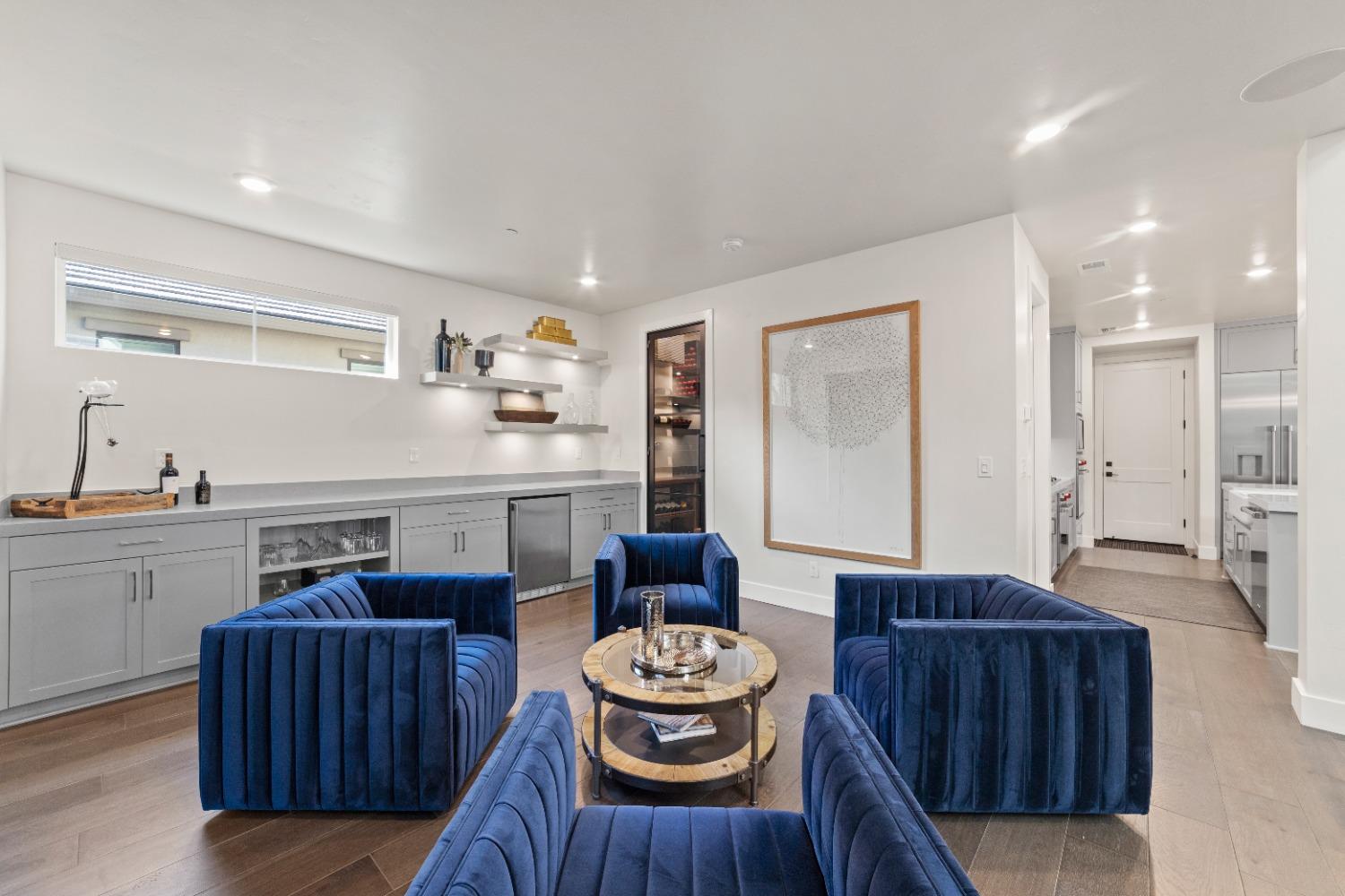 8465 Serene View Road Granite Bay, CA 95746 - Photo 24 of 70 a living room with furniture and wooden floor