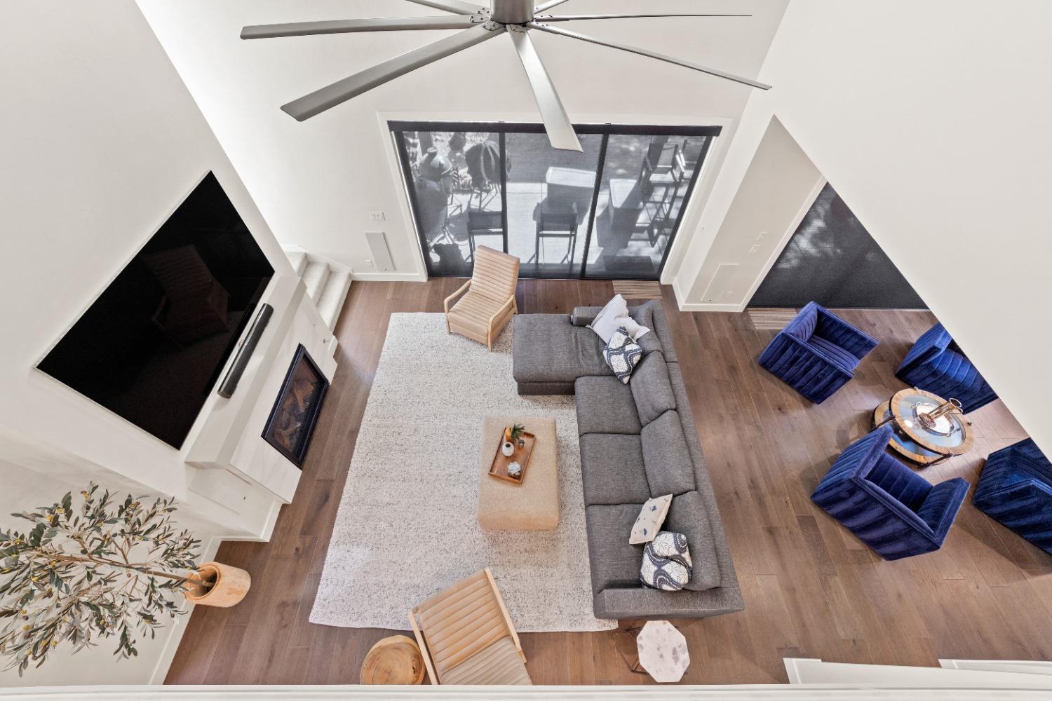 8465 Serene View Road Granite Bay, CA 95746 - Photo 32 of 70 a living room with furniture and a flat screen tv