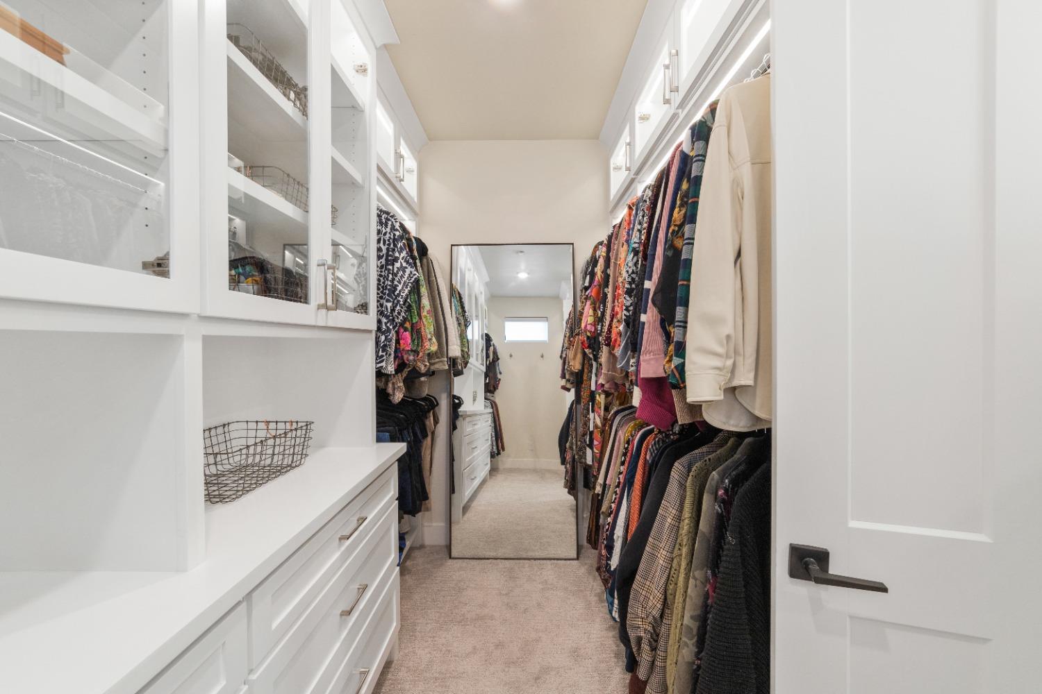 8465 Serene View Road Granite Bay, CA 95746 - Photo 48 of 70 a view of walk in closet with clothes and shoes