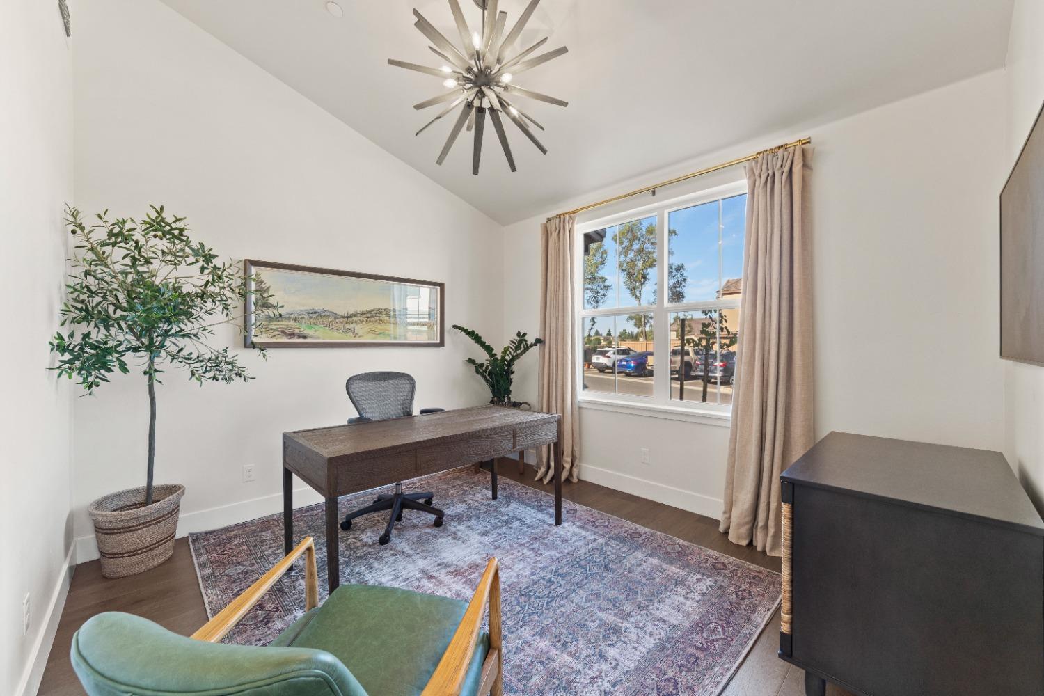 8465 Serene View Road Granite Bay, CA 95746 - Photo 6 of 70 a living room with furniture and a potted plant