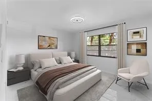 a bedroom with a bed and a chair