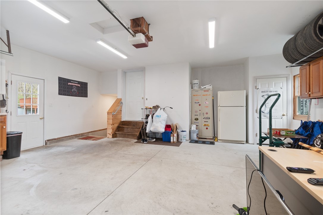 1304 Lake Road Ontario, NY 14519 - Photo 44 of 49 inside of garage with walkup from finished basemen