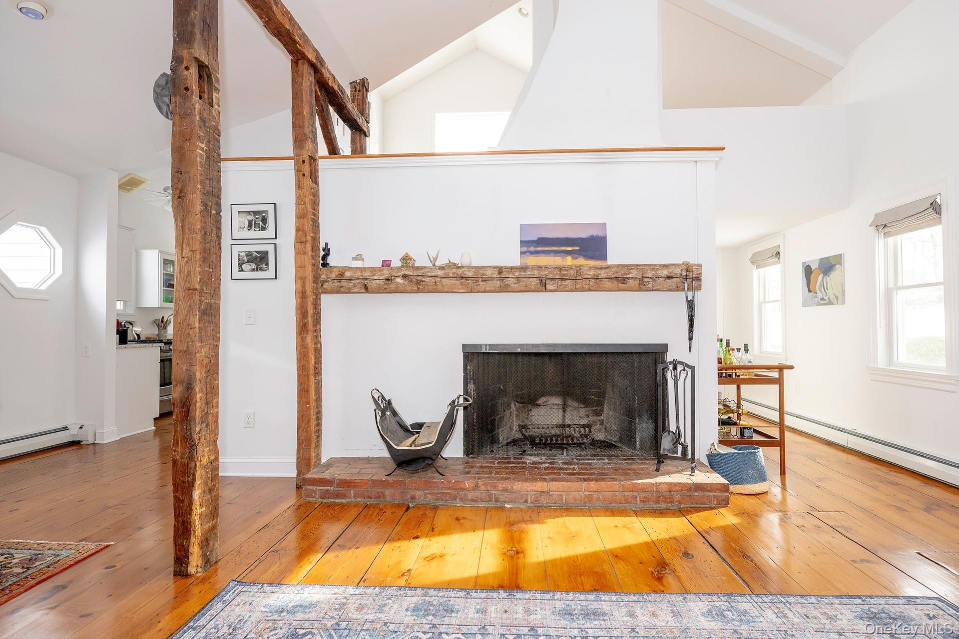 692 Bangall Road Millbrook, NY 12545 - Photo 11 of 30 a view of living room with furniture and a fireplace