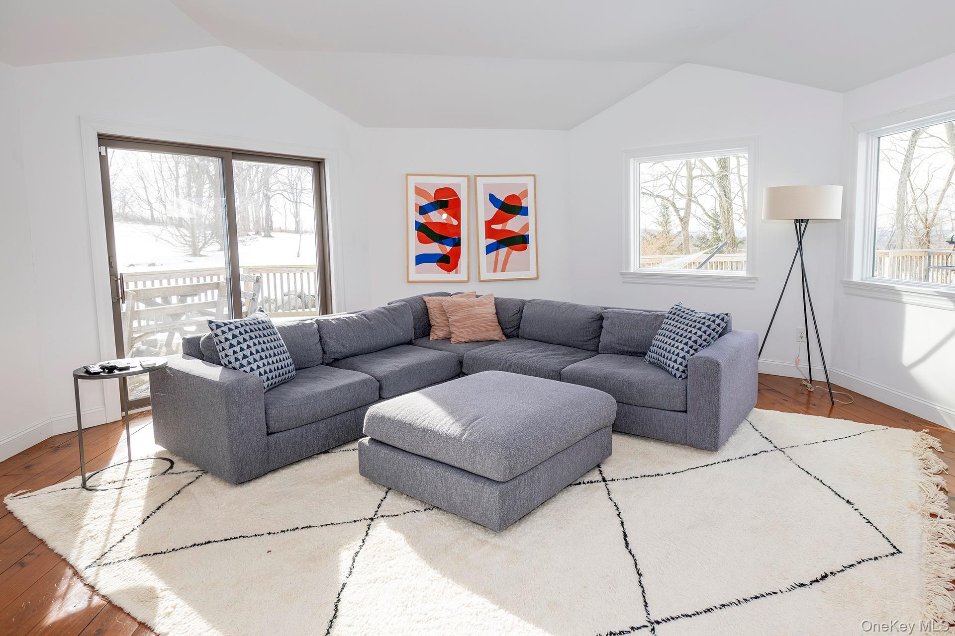 692 Bangall Road Millbrook, NY 12545 - Photo 13 of 30 a living room with furniture and a large window