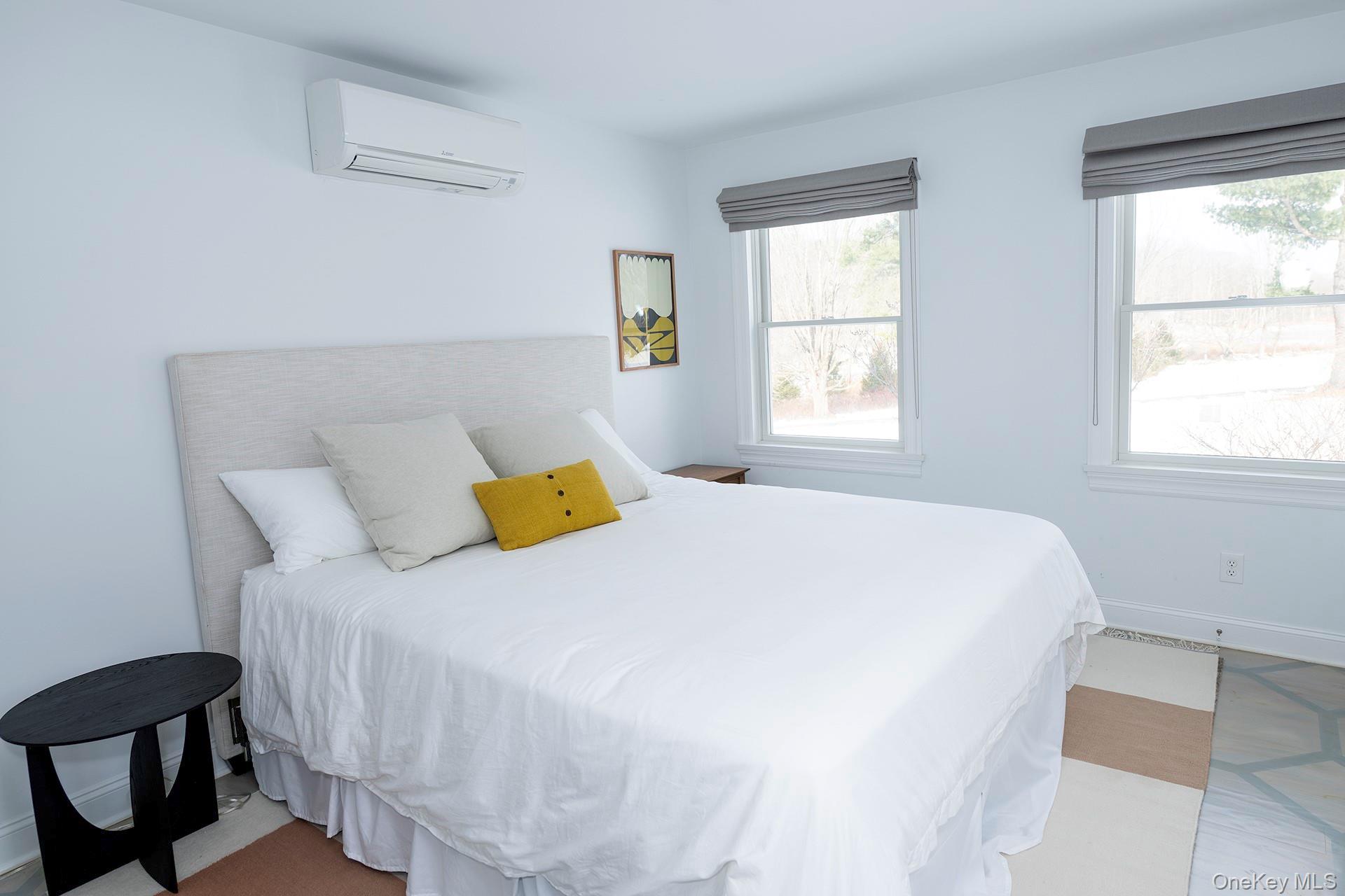 692 Bangall Road Millbrook, NY 12545 - Photo 15 of 30 a bedroom with a bed and window